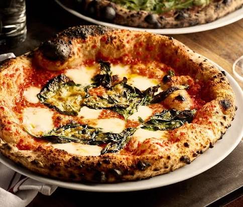 Bestia signature dishes Roasted Marrow Bone Spinach Gnocchetti Crispy
Peruvian Scallop Crudo
Burrata Pizza
